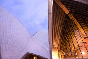 Sydney Opera House at twilight. Looking up from ground level with internal and external surfaces